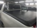 Крышка кузова Toyota Hilux с 2015 алюминиевая роллетная с дугой (нерж сталь)