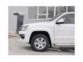 Защита переднего бампера VOLKSWAGEN AMAROK 2016-  D63 волна-75х42 дуга