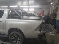 Крышка кузова Toyota Hilux с 2015 алюминиевая роллетная с дугой (нерж сталь)